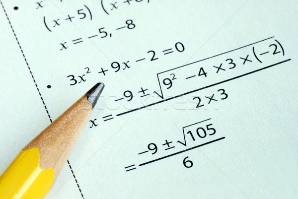 Stock photo: Doing some grade school Math with a pencil