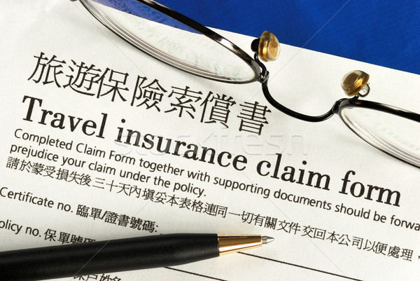 Travel insurance claim form in both English and Chinese Stock photo © johnkwan