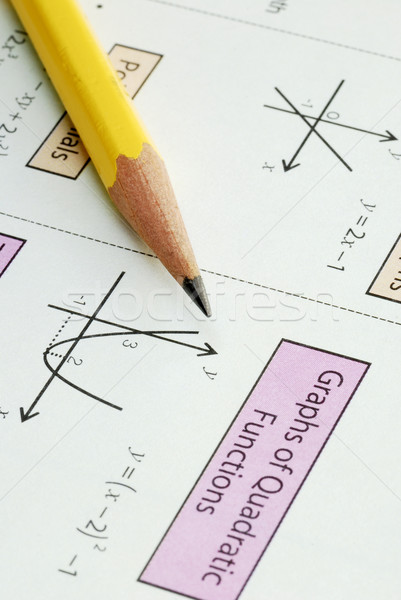 Stock photo: Doing some high school Math with a pencil