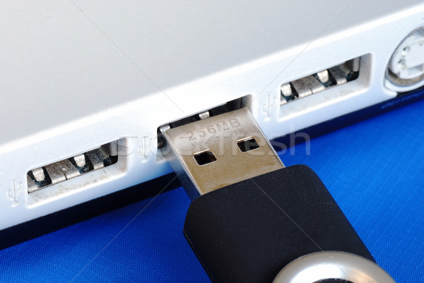 Plug the USB jump drive to a laptop concepts of data backup and recovery Stock photo © johnkwan