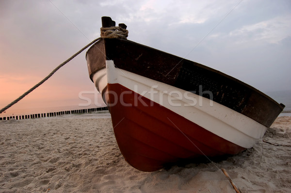 Fishboat on a beach Stock photo © johnnychaos