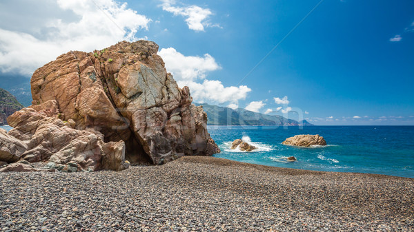 Rocks and pebble beach at Bussaglia on west coast of Corsica Stock photo © Joningall