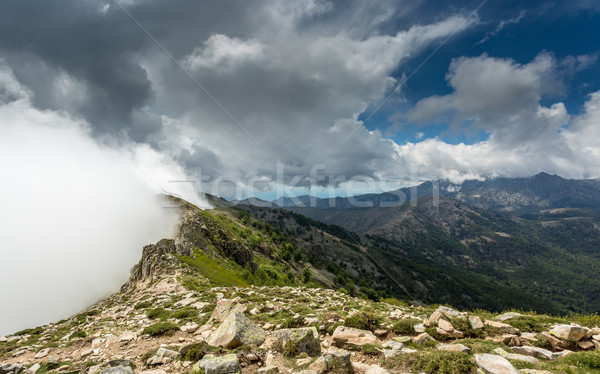 Clouds meet the top of a mountain ridge on GR20 in Corsica Stock photo © Joningall
