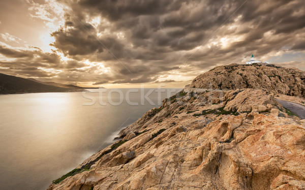 Szeszélyes világítótorony Korzika sötét nyugat part Stock fotó © Joningall