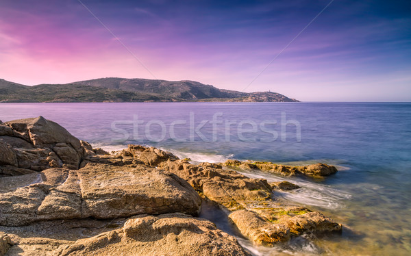 Purple evening sky over Revellata lighthouse in Corsica Stock photo © Joningall