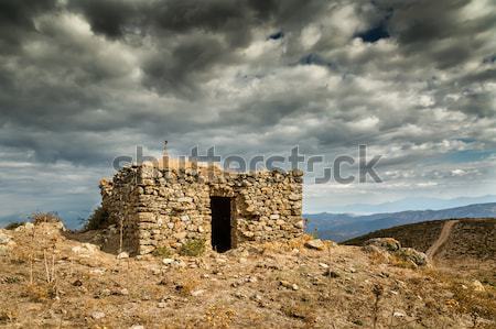 Stock photo: Dark clouds over a bergerie in Balagne region of Corsica