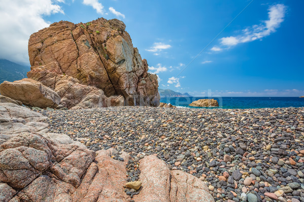 Rocks and pebble beach at Bussaglia on west coast of Corsica Stock photo © Joningall