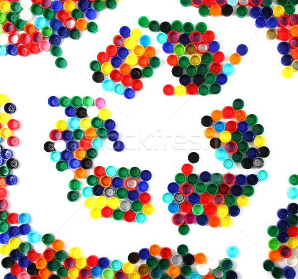 symbol recycle from color plastic caps Stock photo © jonnysek
