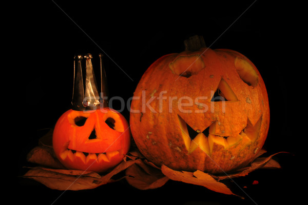 Halloween pumkins on the black background  Stock photo © jonnysek