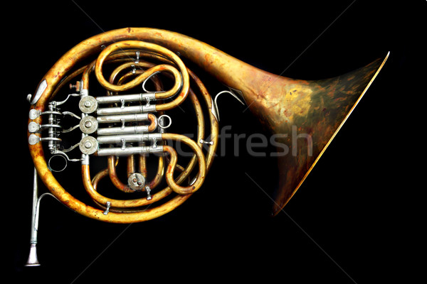 Old french horn isolated on the black background Stock photo © jonnysek