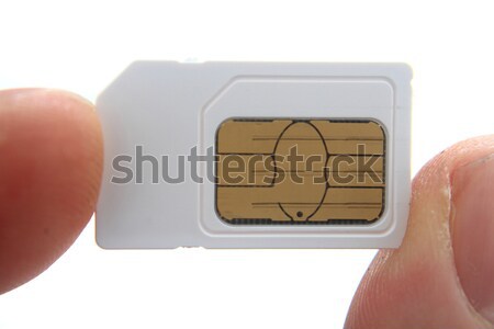 cellphone cimcard in the human fingers  Stock photo © jonnysek