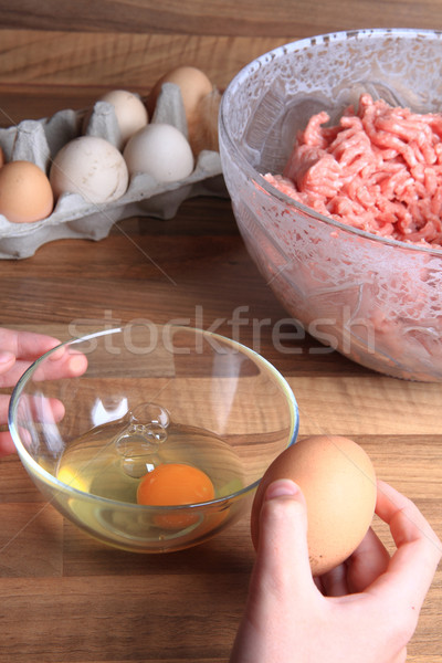 crashing eggs for preparing food Stock photo © jonnysek