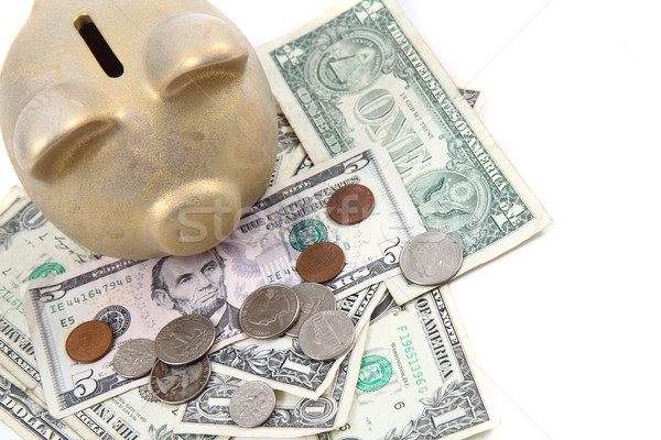 gold pig bank and dollars  Stock photo © jonnysek