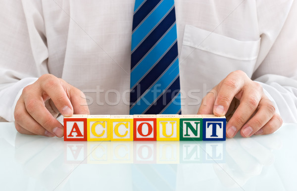 Businessman with blocks Stock photo © joseph73