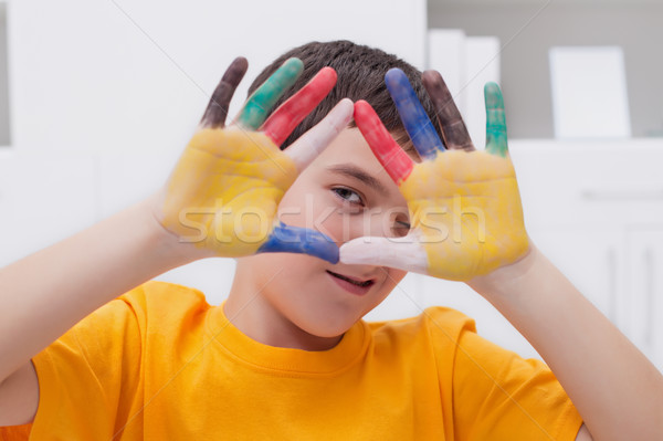 Boy with colored hands Stock photo © joseph73