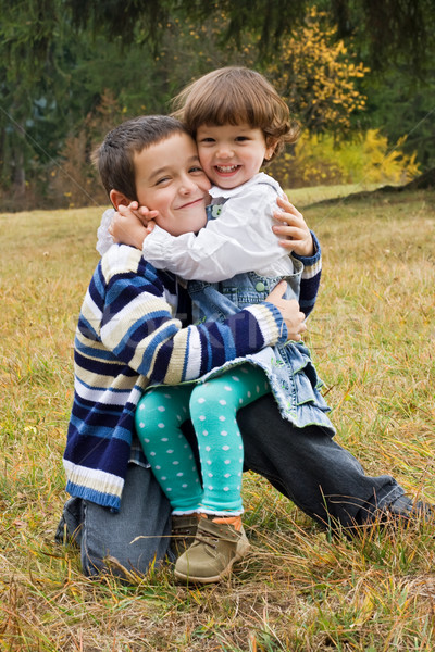 Happy children embracing to each other Stock photo © joseph73