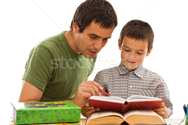 Schoolboy and his father learning Stock photo © joseph73