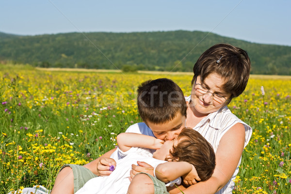 Family in the grass Stock photo © joseph73