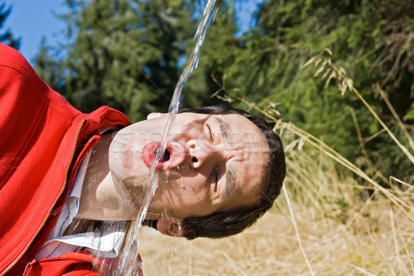 男子 飲用水 淡水 年輕人 冷 天空 商業照片 © joseph73