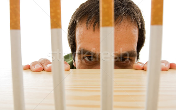 Man peeping from behind the table Stock photo © joseph73