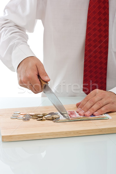 Businessman cutting the currency Stock photo © joseph73