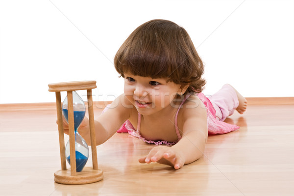Little girl with sand glass Stock photo © joseph73