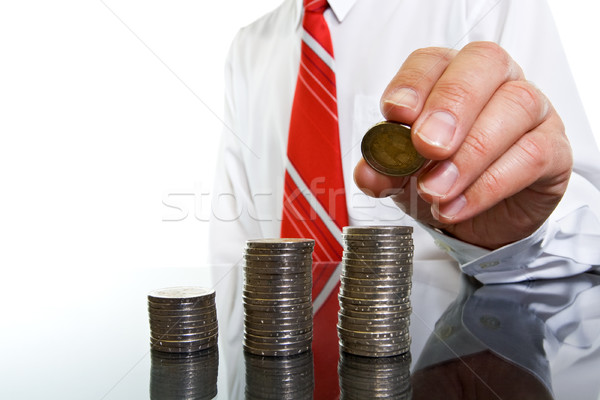 Businessman with coins Stock photo © joseph73