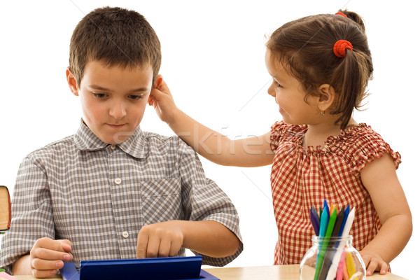 Little girl holding the boy by the ear Stock photo © joseph73