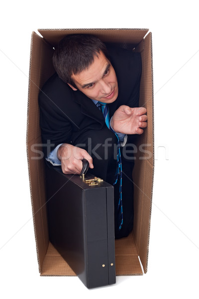 Stock photo: Businessman inside of a cardbox