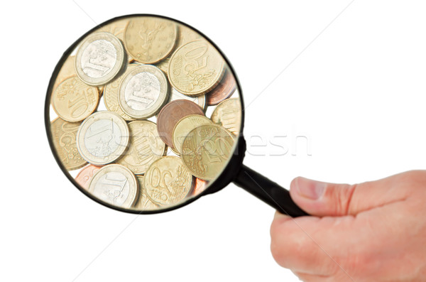 монетами человека увеличительное стекло Сток-фото © joseph73