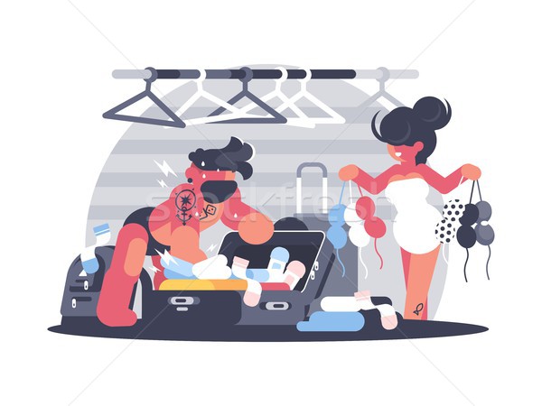 Couple man and woman packing suitcase Stock photo © jossdiim