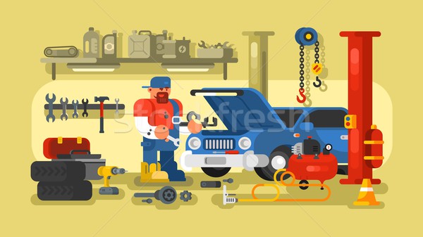 Mechanic Repairs Car in the Garage Stock photo © jossdiim