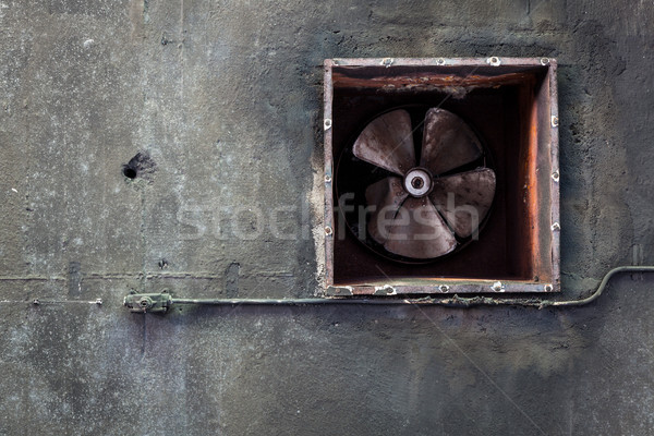 Abandoned air conditioning duct and rusted fan Stock photo © Juhku