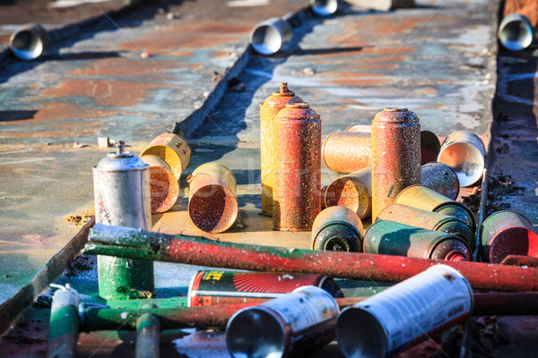 Used graffiti spray cans laying around Stock photo © Juhku