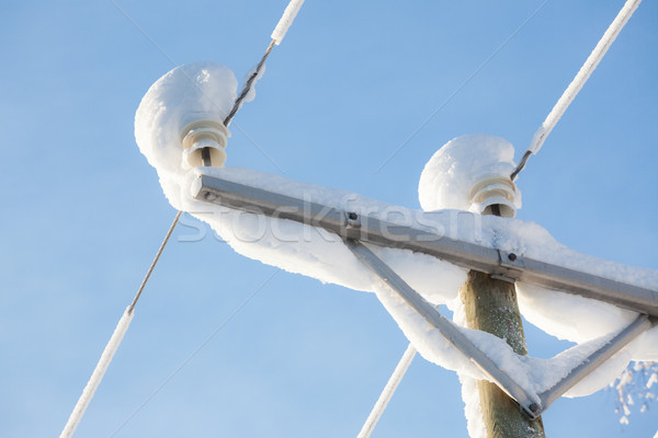 Snow covered power lines closeup Stock photo © Juhku