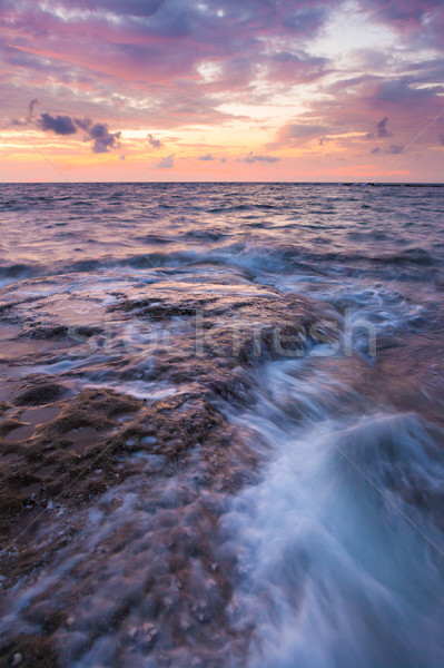 Longa exposição mar rochas crepúsculo marinha água Foto stock © Juhku