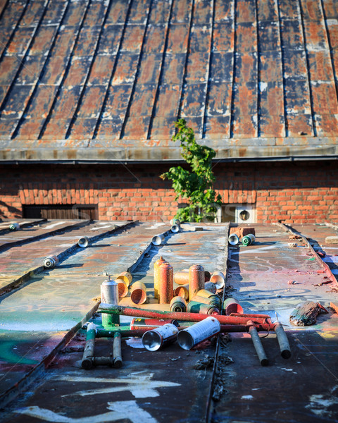 Stock photo: Used graffiti spray cans laying around