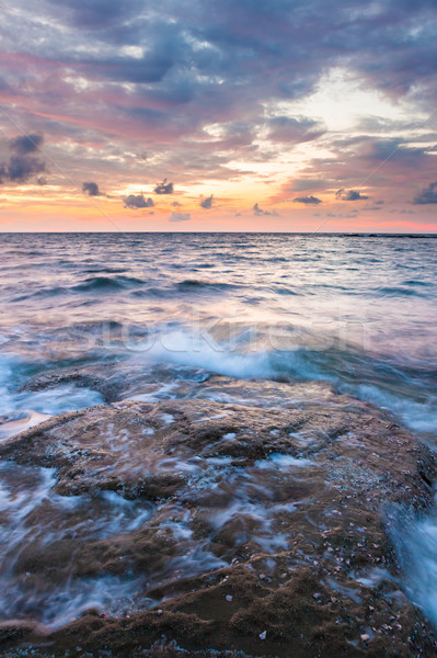 Longa exposição mar rochas crepúsculo marinha água Foto stock © Juhku