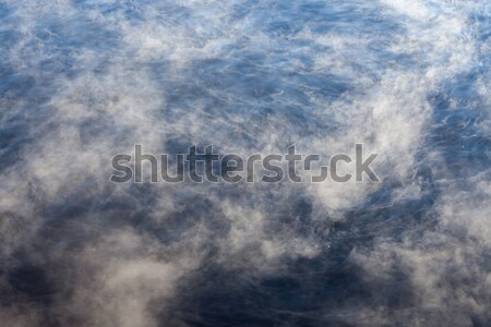 Water vapor on surface of cold water Stock photo © Juhku