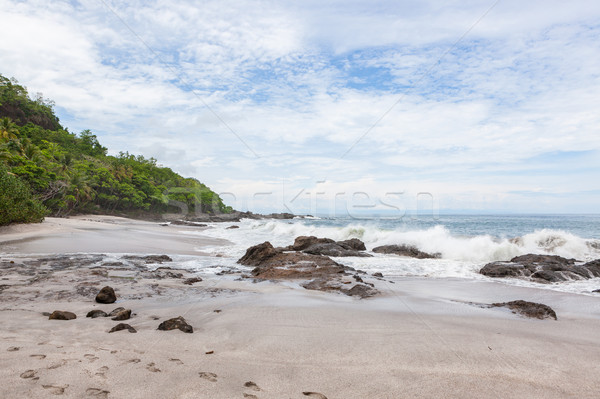 Waves crashing to rocks montezuma beach Stock photo © Juhku