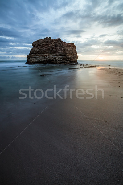 Groß rock Strand Sonnenuntergang Langzeitbelichtung Stock foto © Juhku