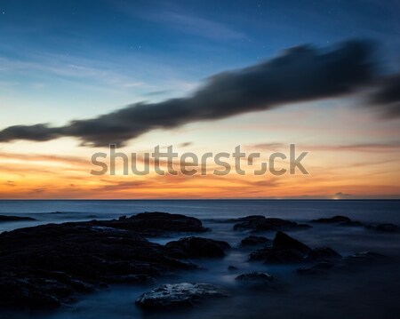 Long exposure night waterscape and vibrant sky Stock photo © Juhku