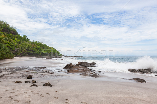 Waves crashing to rocks montezuma beach Stock photo © Juhku