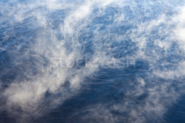 Water vapor on surface of cold water Stock photo © Juhku