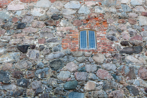 Glass window in old castle wall Stock photo © Juhku