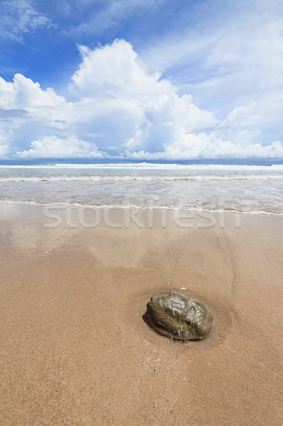 Waves sand beach and clouds sunny day Stock photo © Juhku