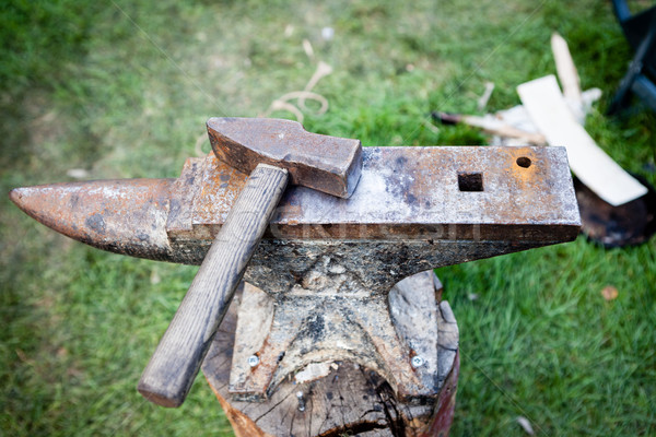 Rusty iron anvil and hammer Stock photo © Juhku