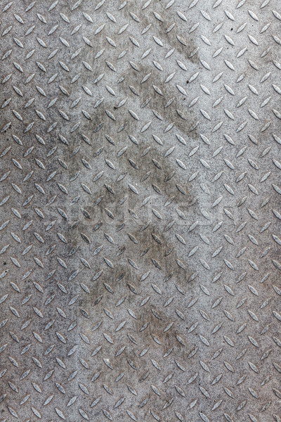 Stock photo: Dirty metal pattern and tyre tracks