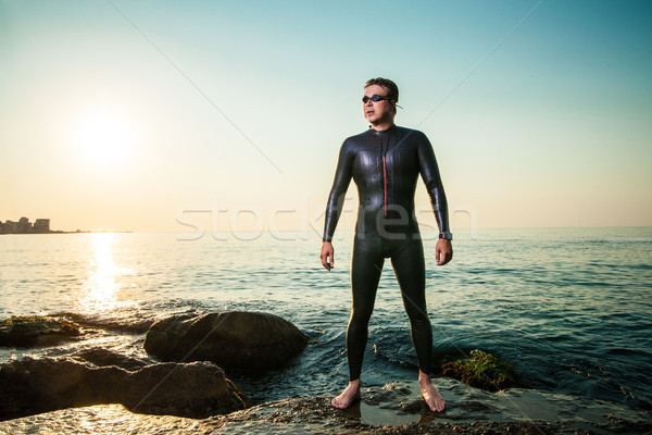 Diver standing in sea waves Stock photo © julenochek