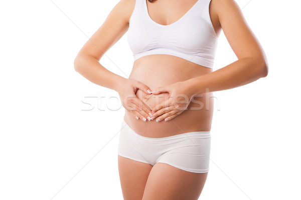 Stockfoto: Zwangere · vrouw · hart · uit · baby · buil · handen